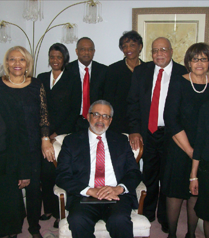 GETTING READY! Standing l-r, Elizabeth Ann Harvey Jones, Albersynia Rice Quarles (Chairperson), Farnese Hicks, Thomas Fuqua, Barbara Roberson Duncan, Carl Jones, Geraldine Wilkes Tanks (Co-chairperson), Thelma Louise Sherman Hayes and seated is Hylan T. Hubbard III (Budget Manager/Class President).