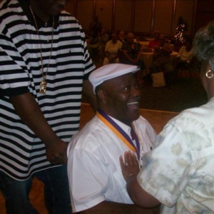 "Rennee" Russell DHS-'69, getting his award!