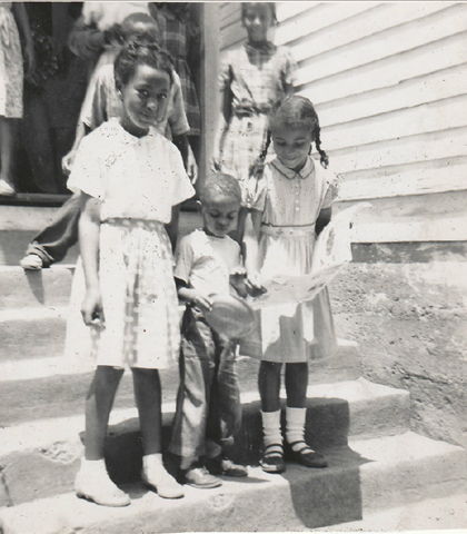 Me, on the steps of Kingston! Guess who my first grade teacher was??