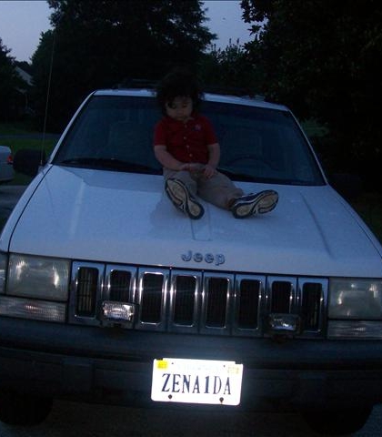 Posing on Zee's Jeep!