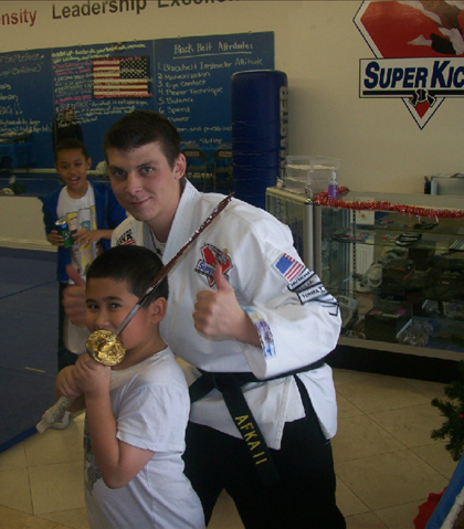 At Jarred's birthday party at Super Kicks, instructor Davis entertained the kids!