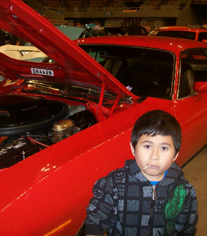 Jarred at the MDA car show in Roanoke, March 2012! Check out the red 'Cuda! I wish I could have kept my blue one!