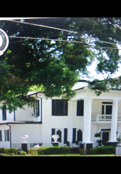 Notice the white house in the background, it is a block from the Police Station! Notice the white house in the background, it is a block from the Police Station!