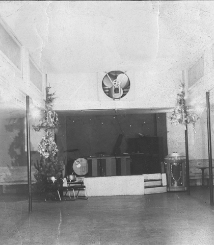 The Mecca! A classy venue back in the day! Notice the large dance floor suitable for all occasions. I spotted a Seeburg "trash can" Jukebox music system (just to the right of the stage), which probably filled the room with all of the music from the decade!