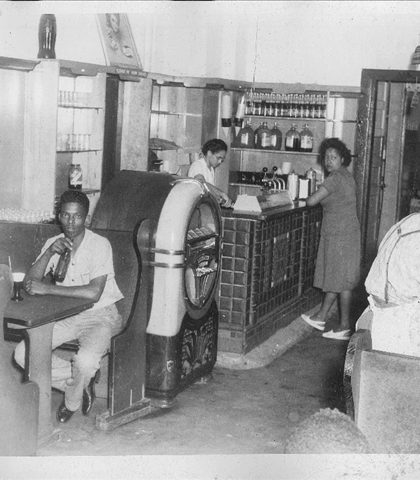 This shows the resturant/soda fountain, ice cream parlor, area of the Mecca! You know I'm a jukebox nut, and believe that this is a Wurlitzer, popular during the time!