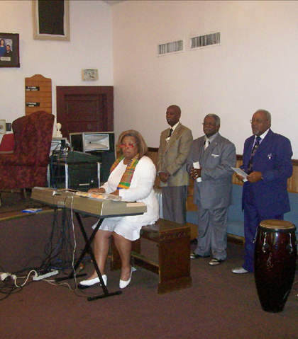 Hermina Walthall Hendricks directing the choir!