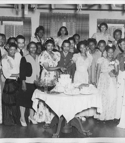 A birthday party...see anybody you know? Help me out here?