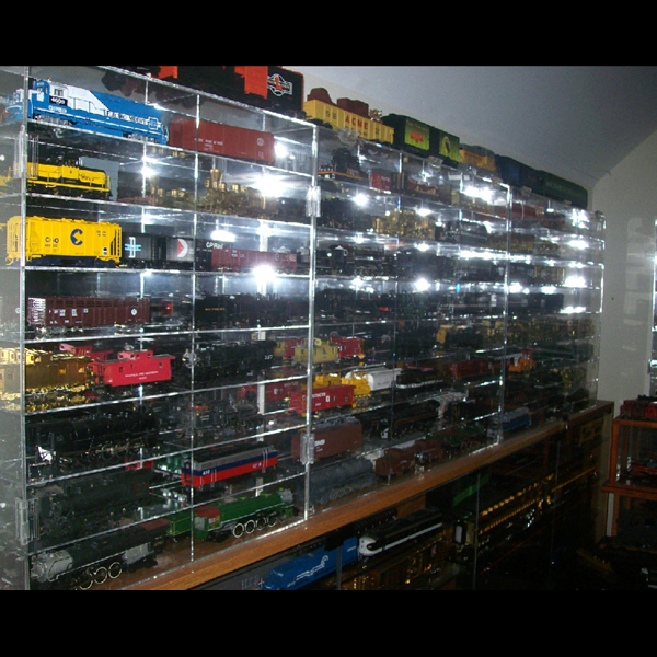 Wiley installed glass cases for his special rare and special locomotives and train cars. The cases went from one wall to the other! Wiley installed glass cases for his special rare and special locomotives and train cars. The cases went from one wall to the other!