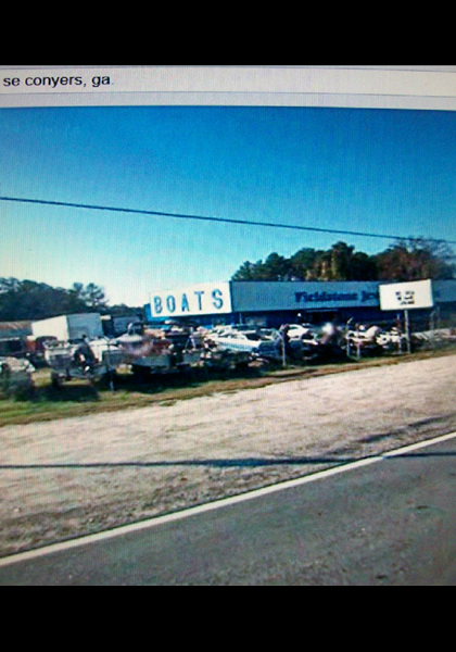 When the shooter in first girl speeds out of the boat lot, the sign says Covington 9 miles! When the shooter in first girl speeds out of the boat lot, the sign says Covington 9 miles!