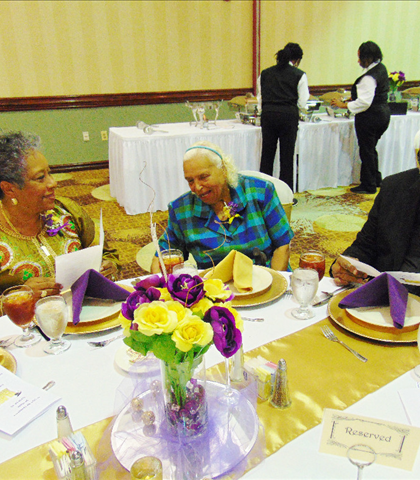 Our Trachers table! Ms. Marie McCoy and son!