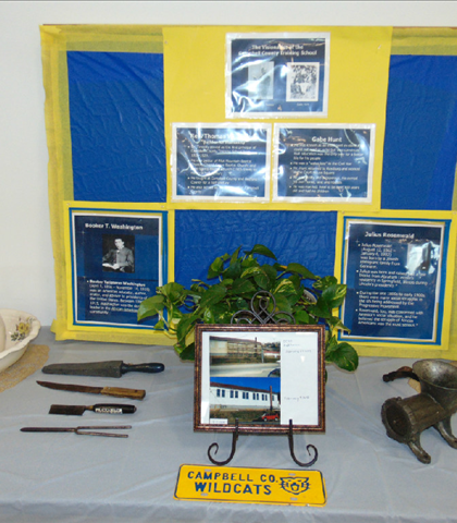 Items from the past! Water jugs, straightning combs, I remember Dad standing in the doorway ringing the bell to call everyone in from recess!